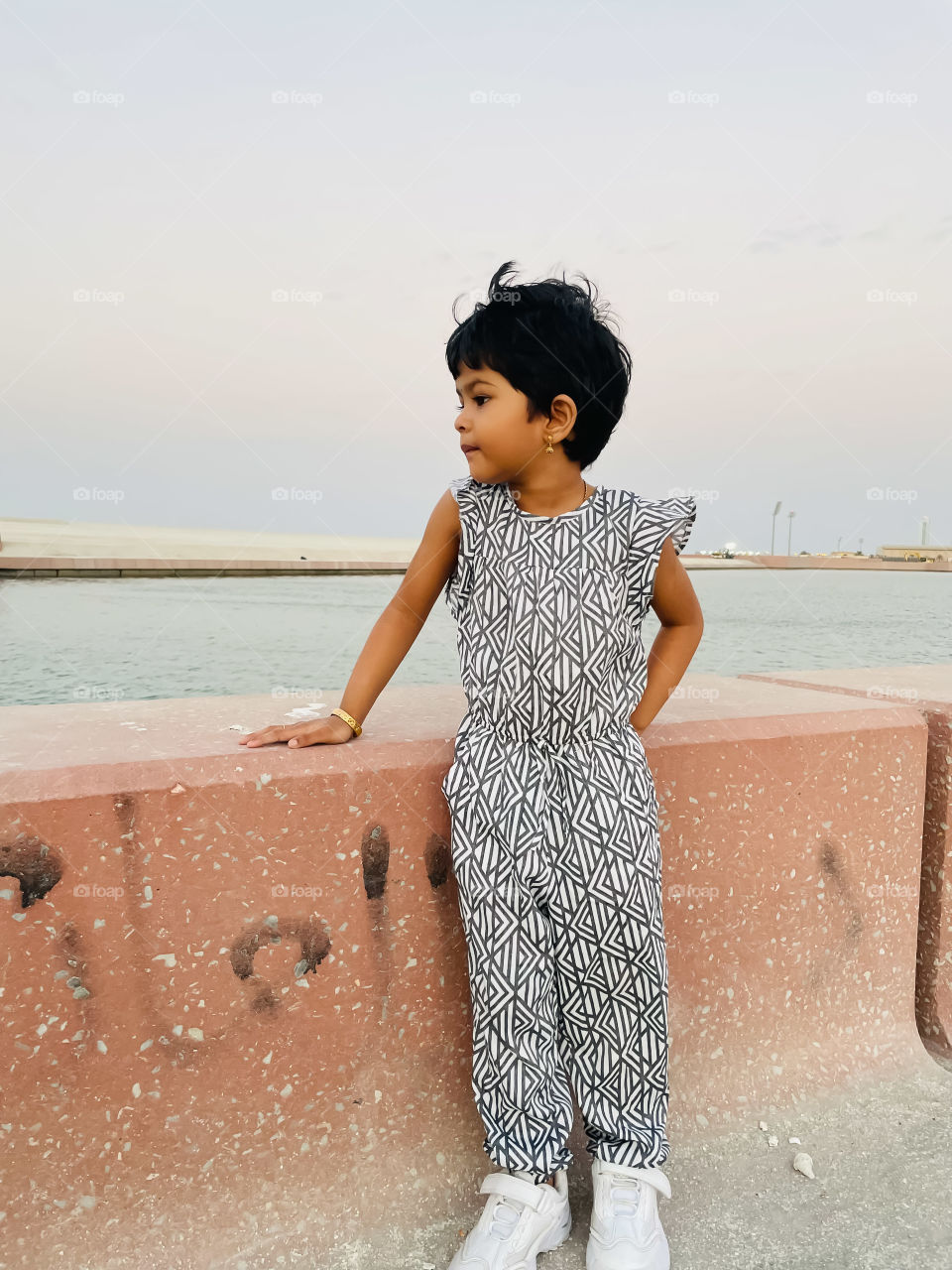 Child looking at the waters