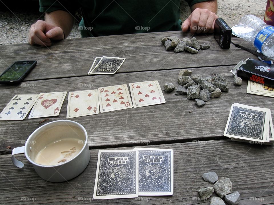 Card game on wooden table