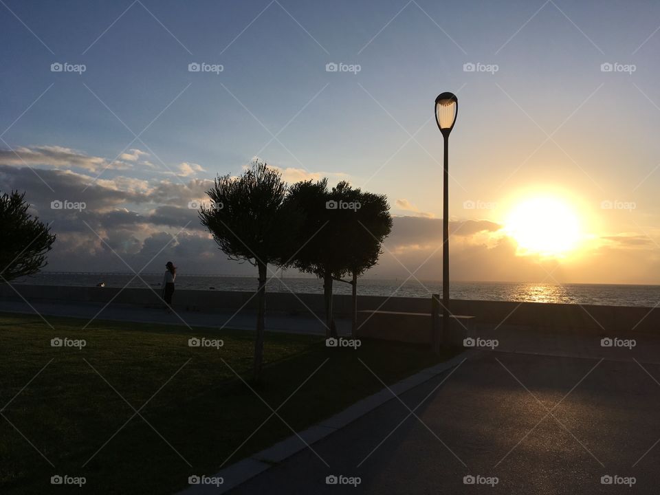 Girl in the summer sunset