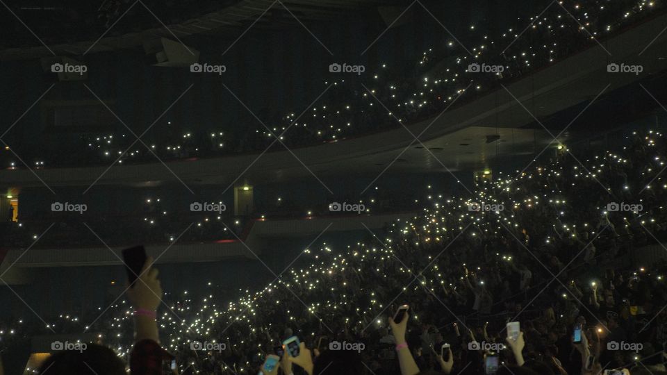 fires of fans at the concert