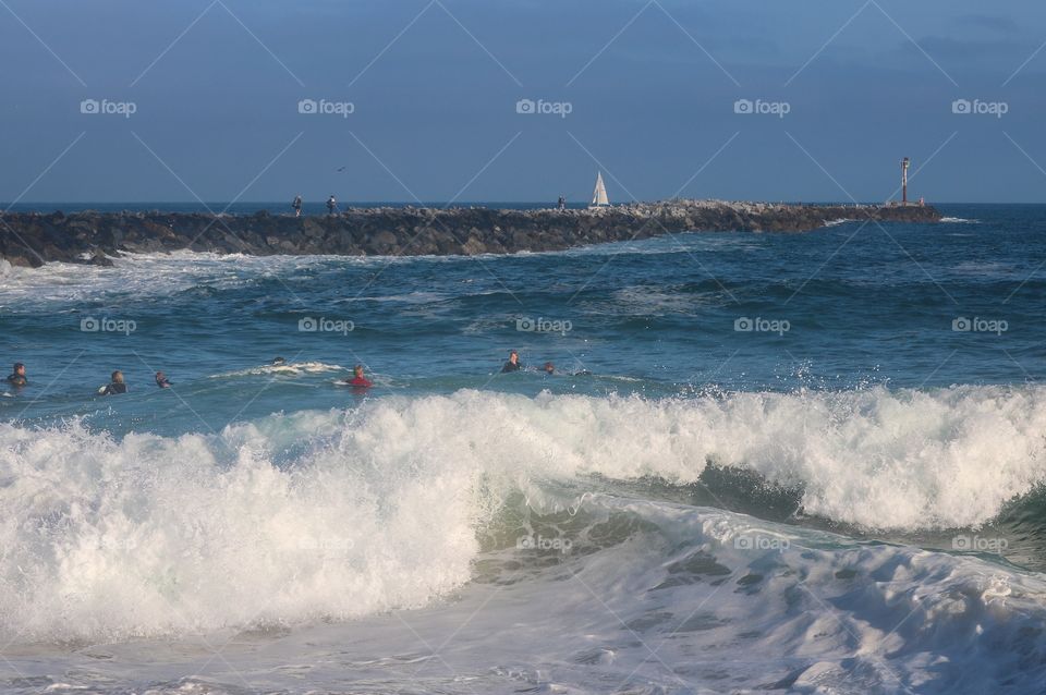 People enjoying the sea
