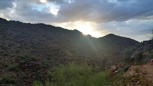 Sun Rising Over Arizona Mounta. Sunrise on Sunrise Trail Scottsdale Arizona McDowell Mountains
