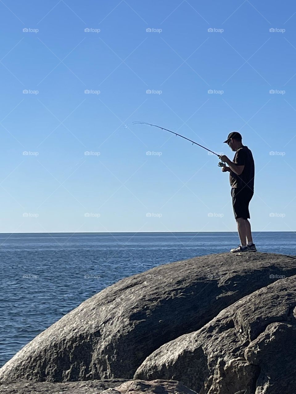 Fishing on a rock 