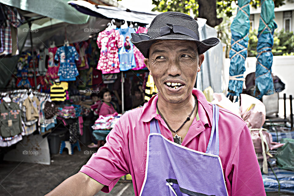 Bangkokian seller. portrait of a street seller in Bangkok