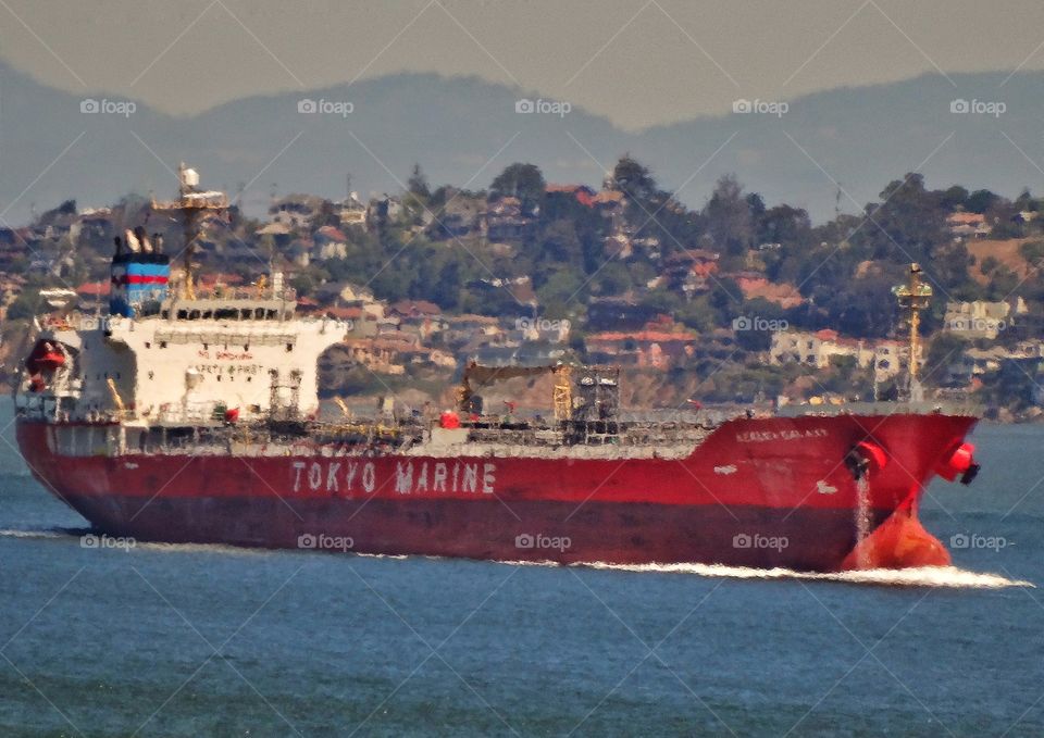 Cargo Ship In Harbor. Cargo Ship Steaming Out Oc San Francisco Bay
