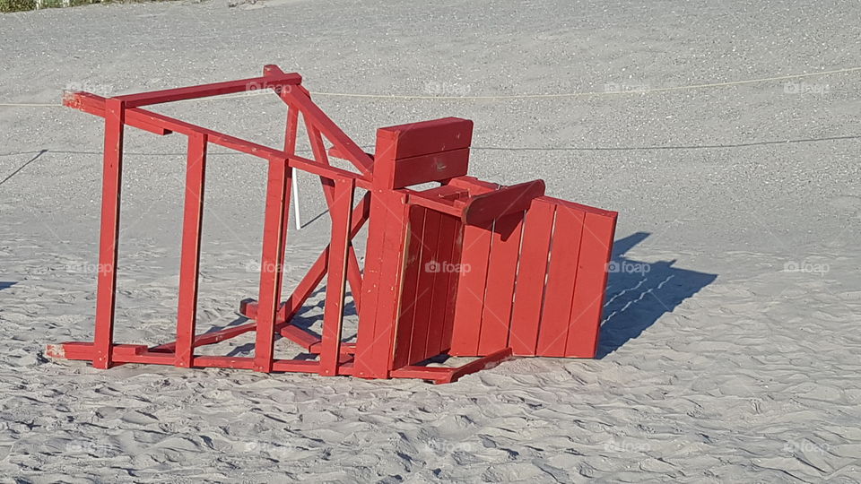 Lifeguard chair on sandy beach