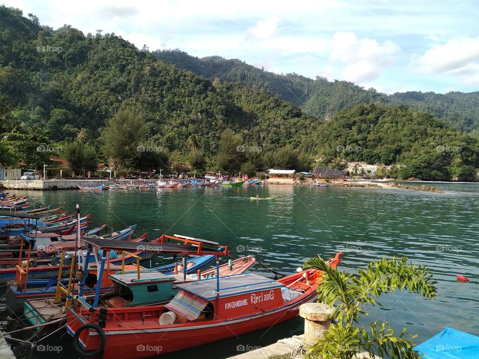 View of ships docked on the beach of Aceh, Indonesia.