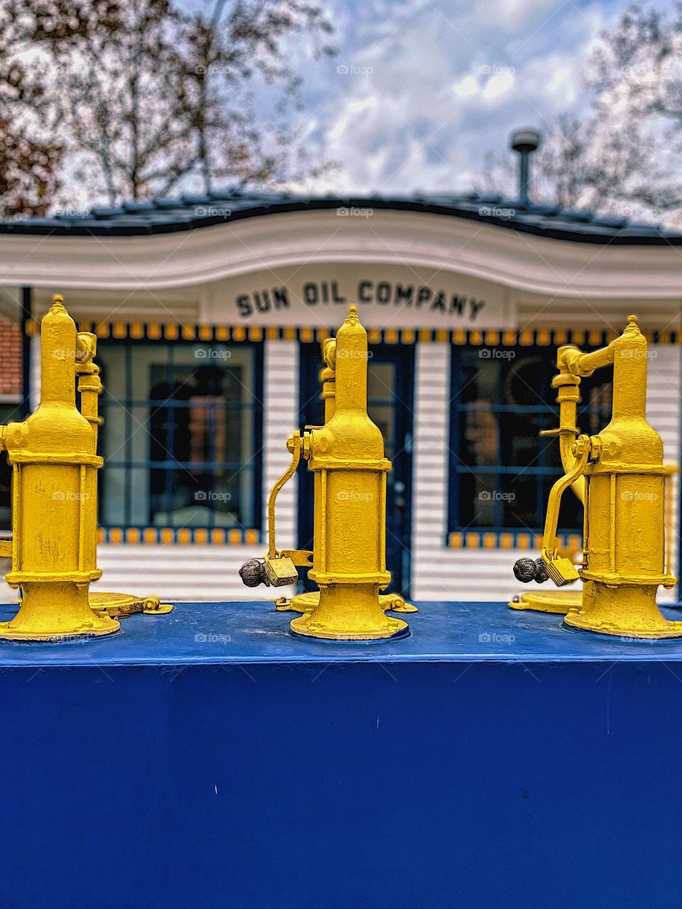Sun oil company, Sunoco gas pumps, sun oil company gas pumps, yellow and blue gas pumps, nostalgic gas station, gas station nostalgia