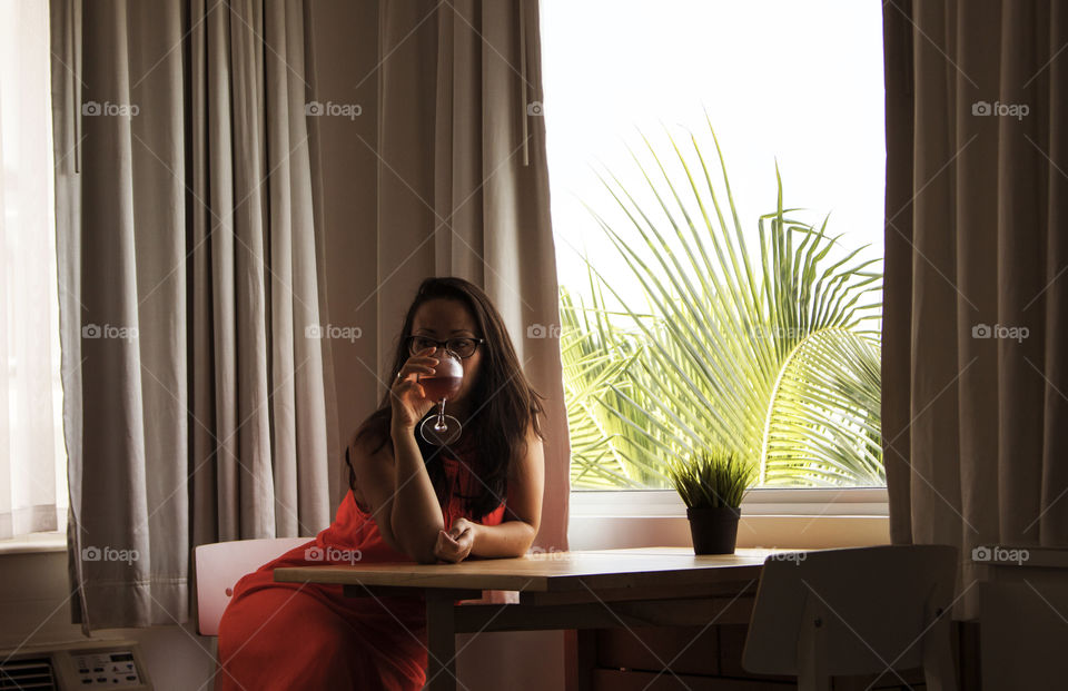 Portrait of a woman drinking wine 