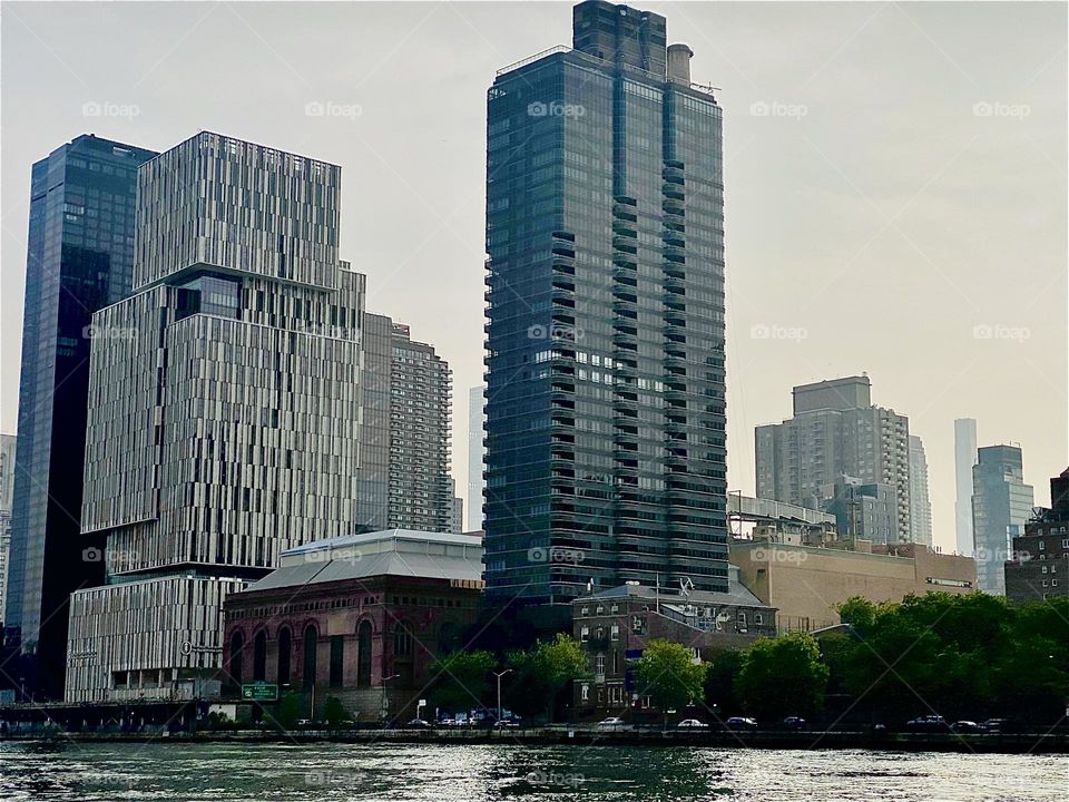 Motoring our new “23 O’Day” sailboat home to “Newtown Creek” from “Mamaroneck” on the “East River” along the “Upper East Side” of “Manhattan” we came by many interesting sites of which these high rises are one. 2023. Hypnotic Productions