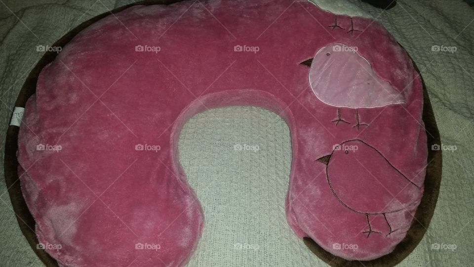 Boppy nursing, feeding, and lounging pillow for baby and mom or dad