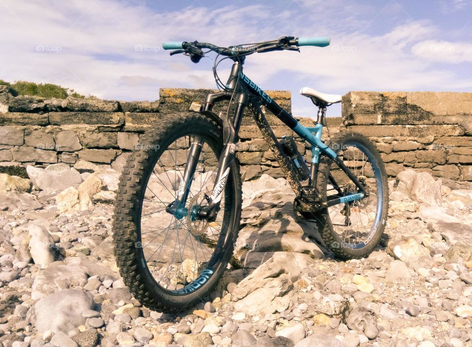 Mountain bike at rocky beach