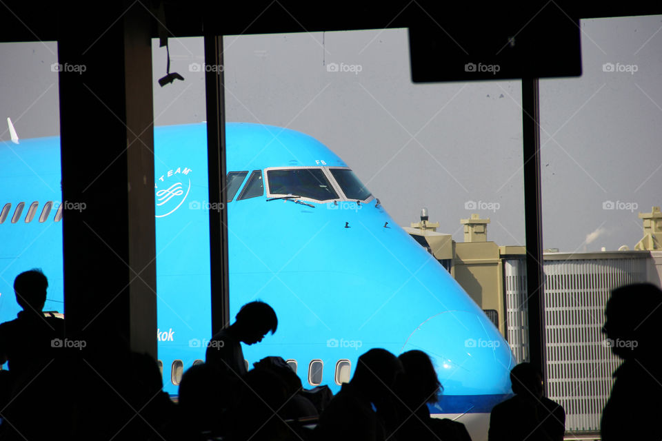 plane ready for boarding. The view from inside of the airport on an airplane of klm.