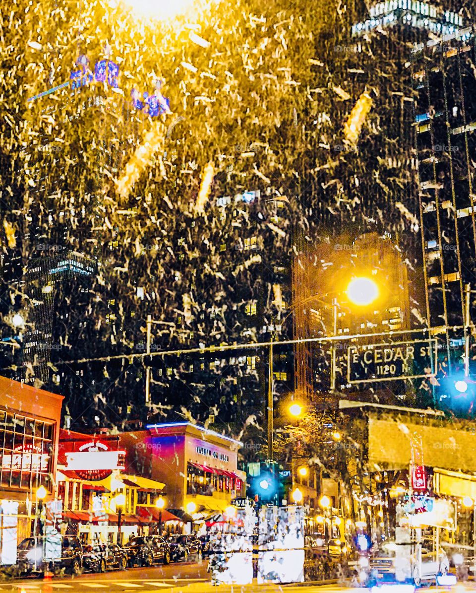 Beautiful and Bright Chicago City Street Lights in Winter Snow Storm. 