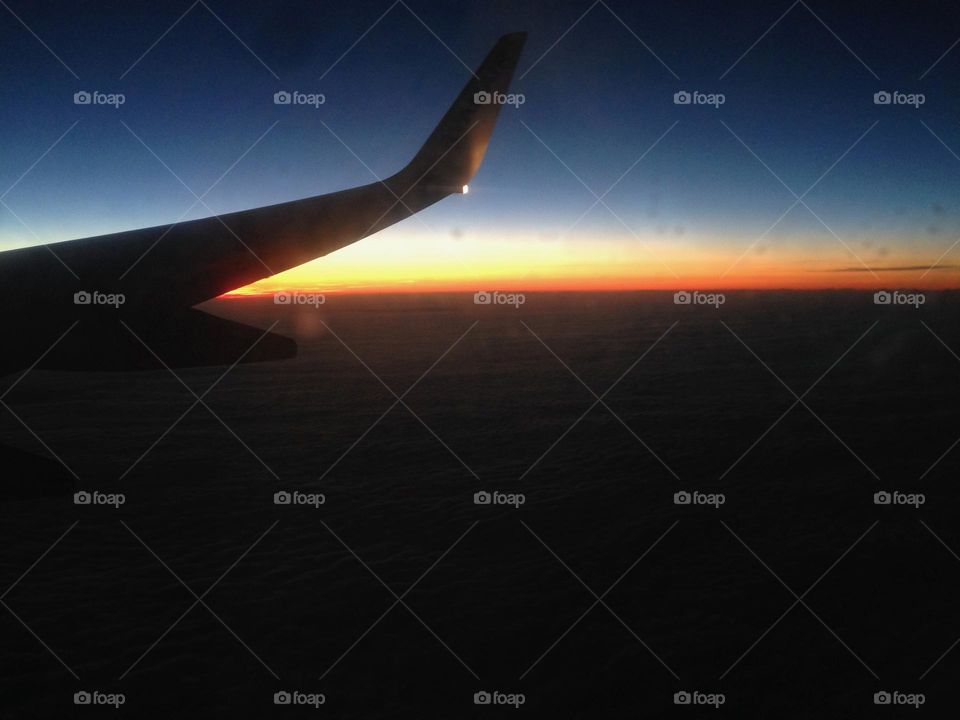 Airplane view of the orange sky