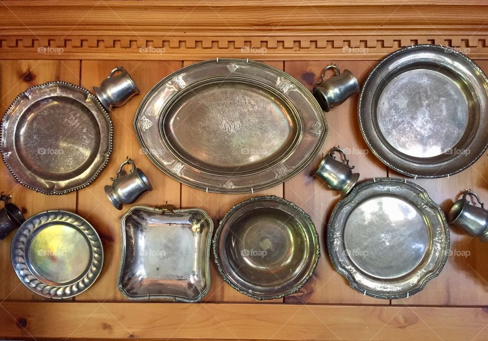 Rustic silver hanging on a wall