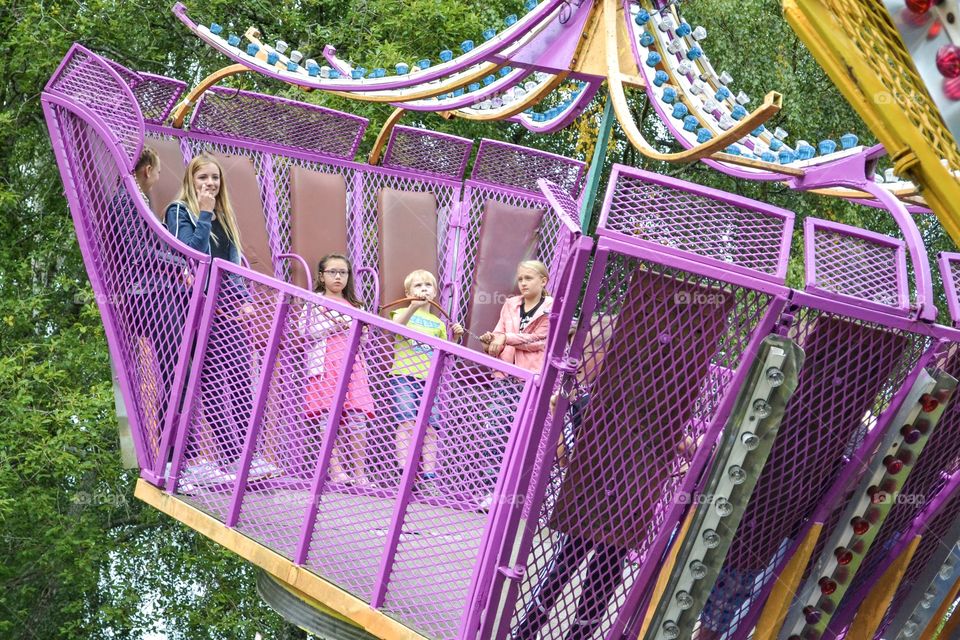 Children on an amusement ride