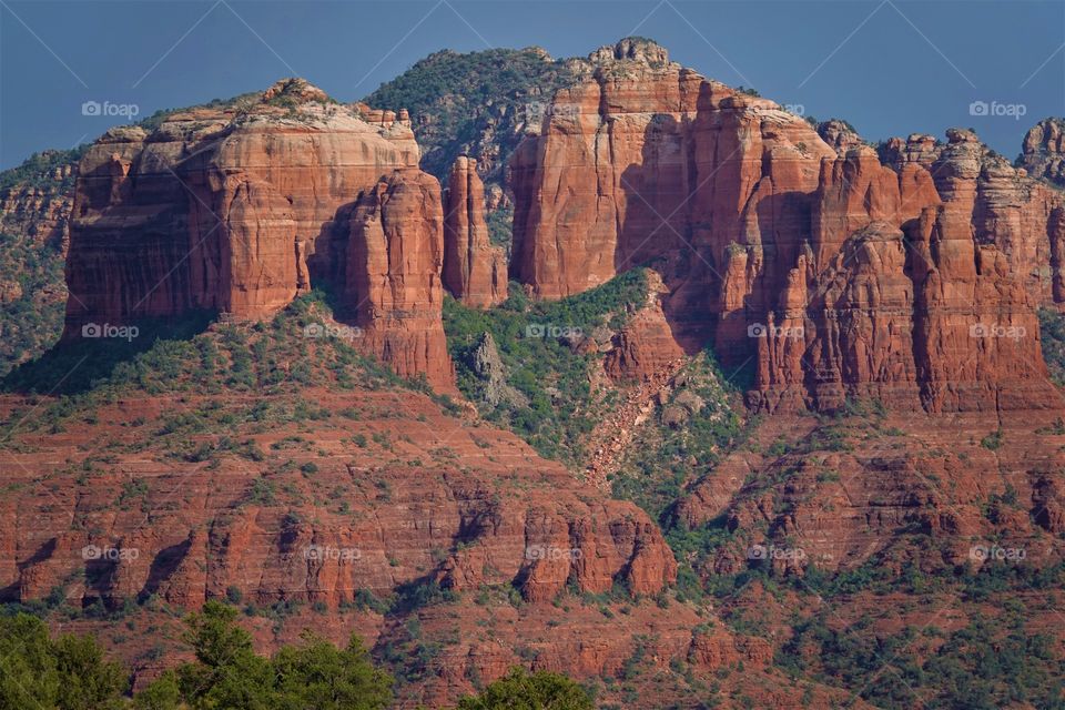 The majestic rock structures of Sedona Arizona shine bright in the afternoon sun.