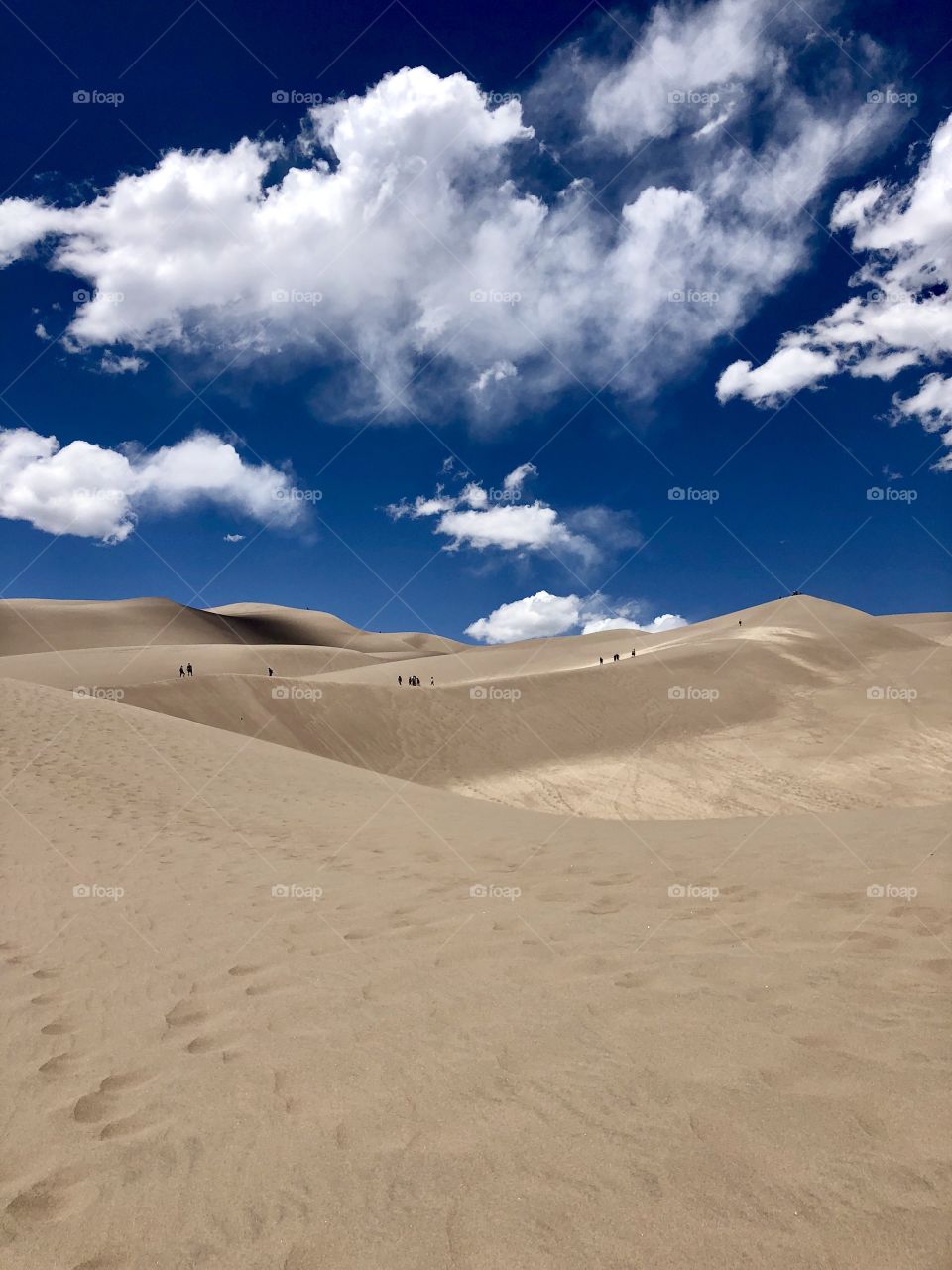 Sand dunes, sky, clouds 