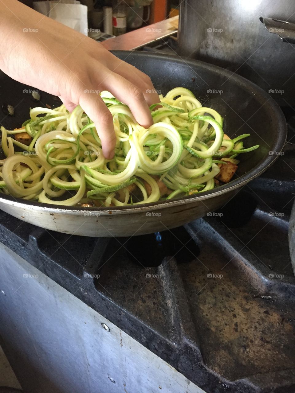 Cooking zucchini noodles 
