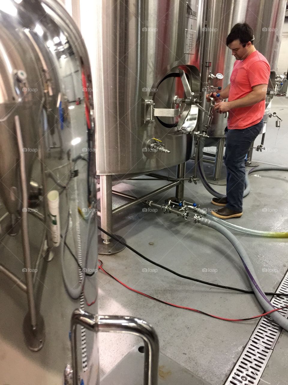 Brewery . Man in brewery, Miami, Florida 