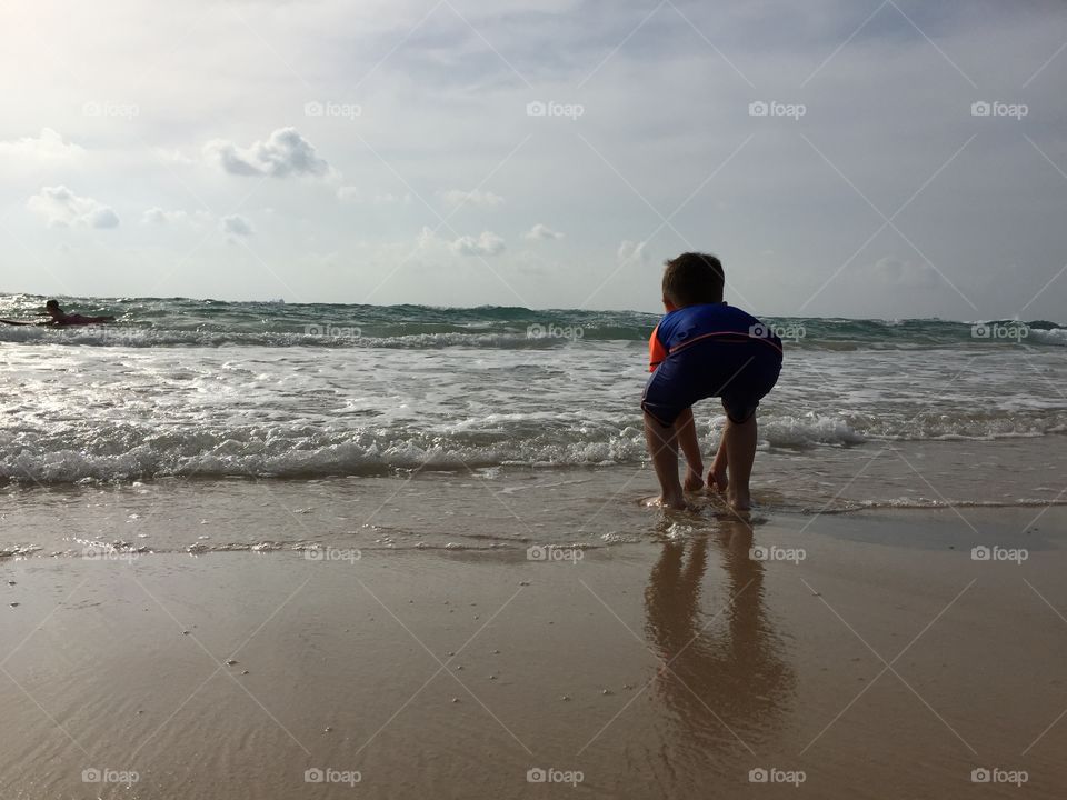 Play with water on the beach