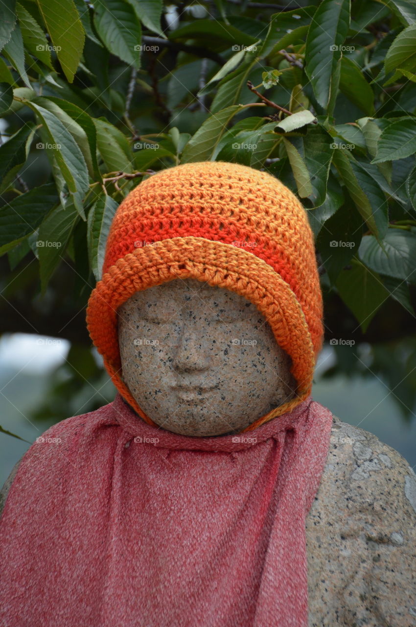 Japanese Buddha Statue With Hat
