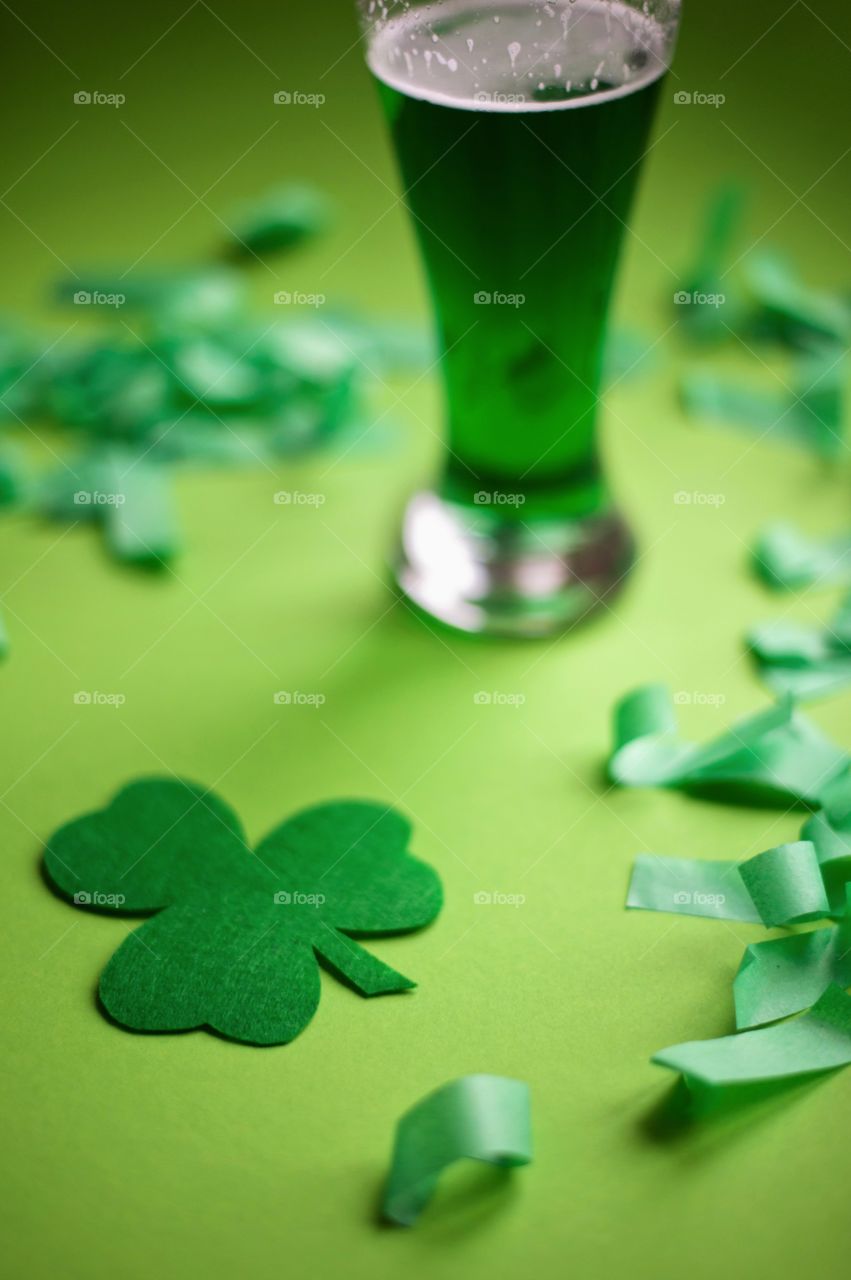 Green beer on green background