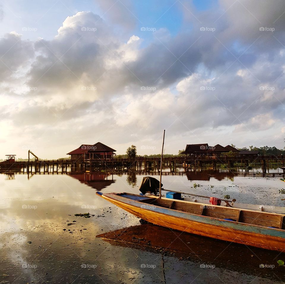 Scenic view of lake against blue sky