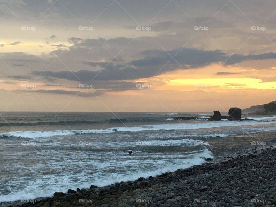 Beautiful sunset on Sunzal beach, rocks on the ocean