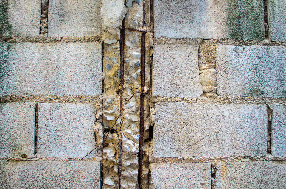 Old brick wall blocks.The structure of the dilapidated walls.The pillar struc ture of the damaged wall.