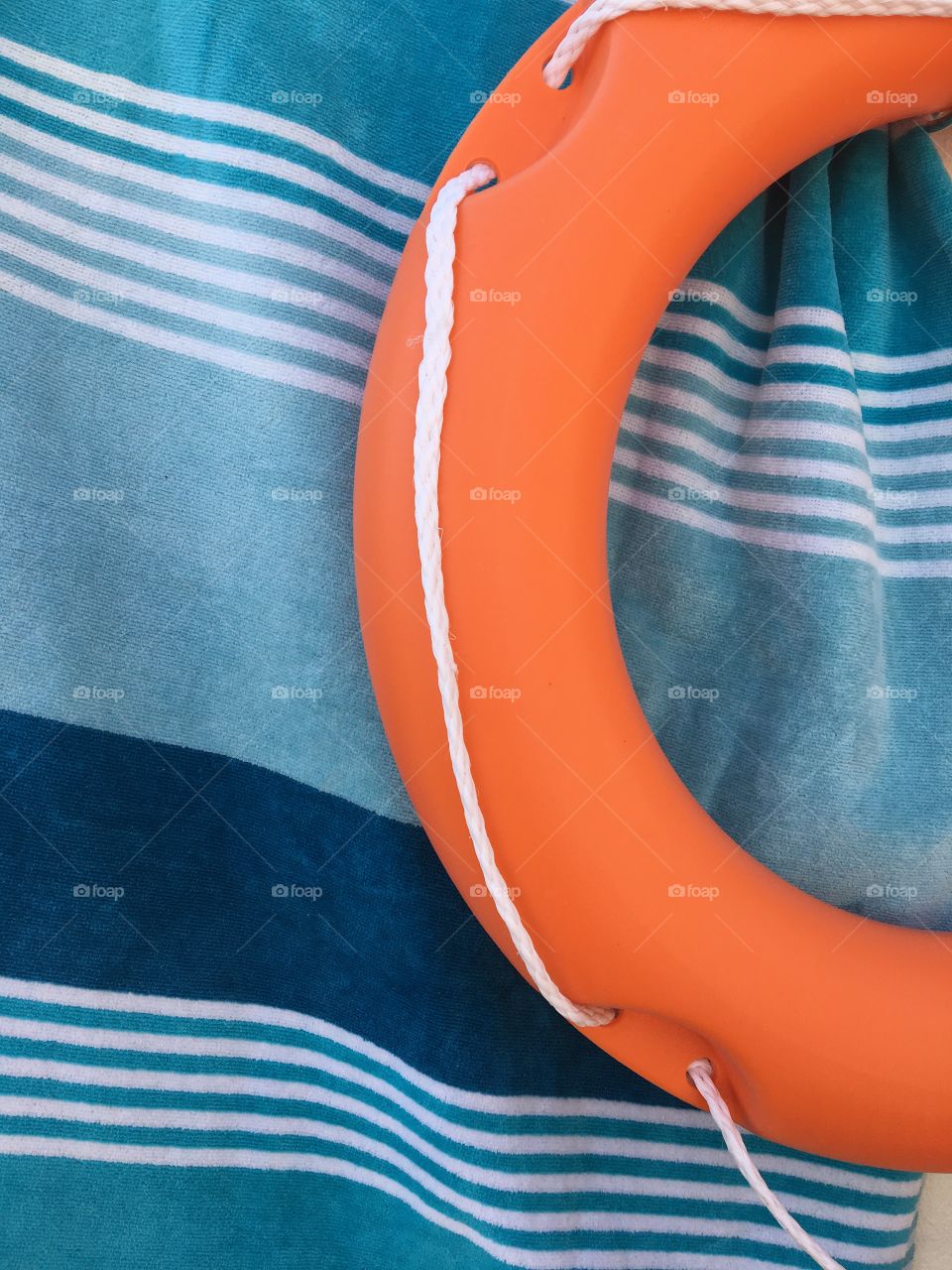 Orange wings on blue towel