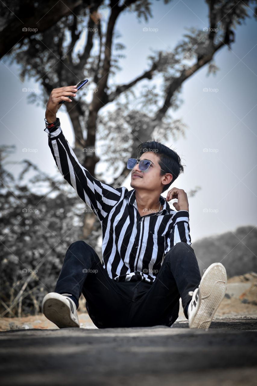 Young boy street photography in free time