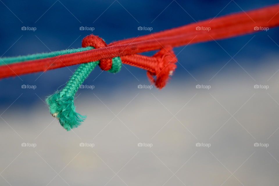 Red and green in a knot. Complementary colors 
