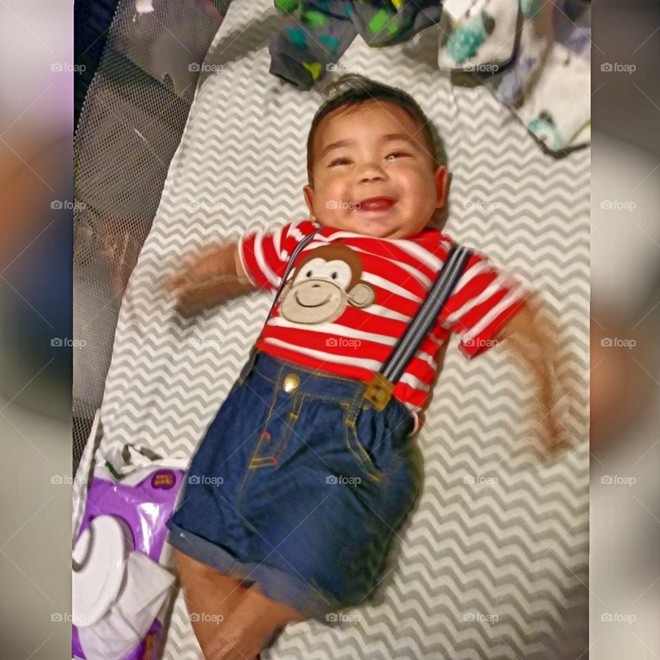 Baby in a monkey shirt