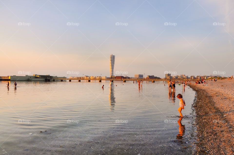 People enjoying on beach