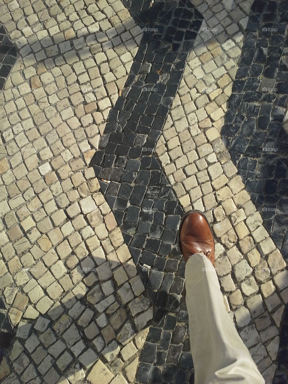 man walking in Lisbon. shot ar lunch time