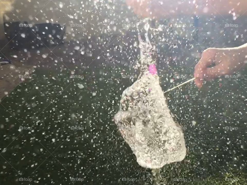 Playing with water.