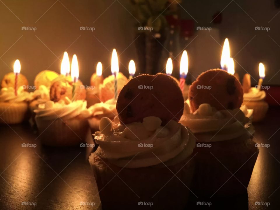 Candles on cup cakes for a birthday celebration 