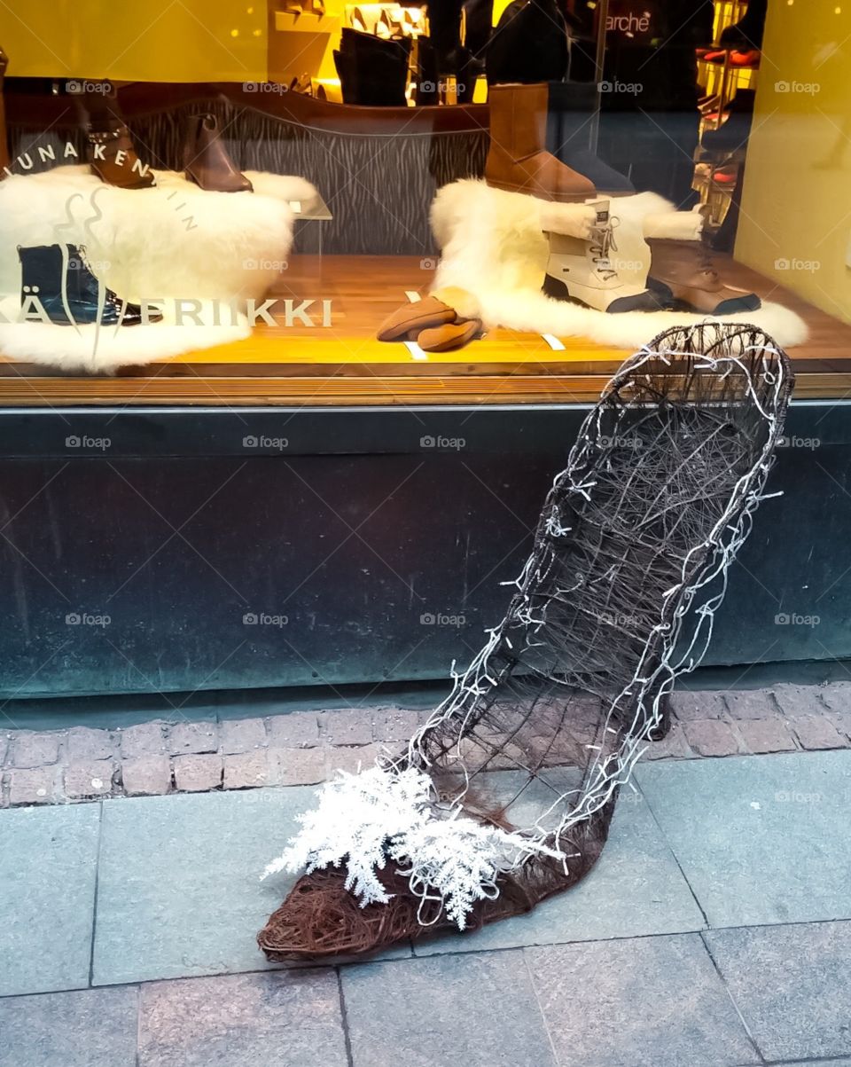 Local art of a high heel outside a shop in Jyvaskyla, Finland