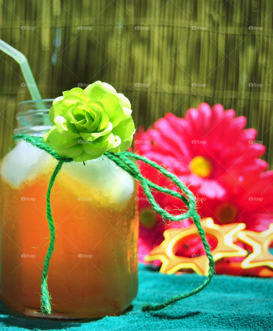 Cold iced tea in a mason jar