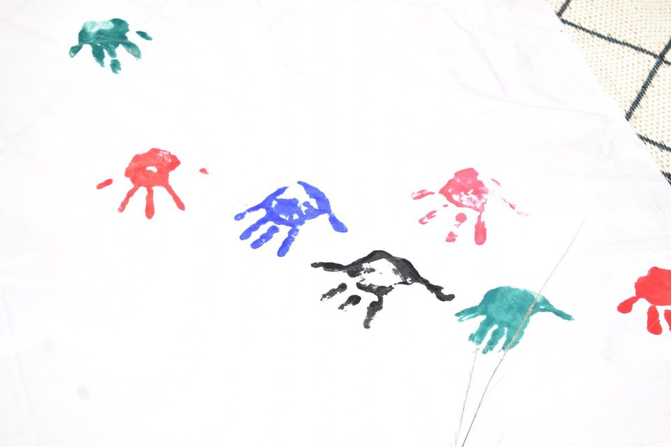 colour week . white background with colour hand and finger