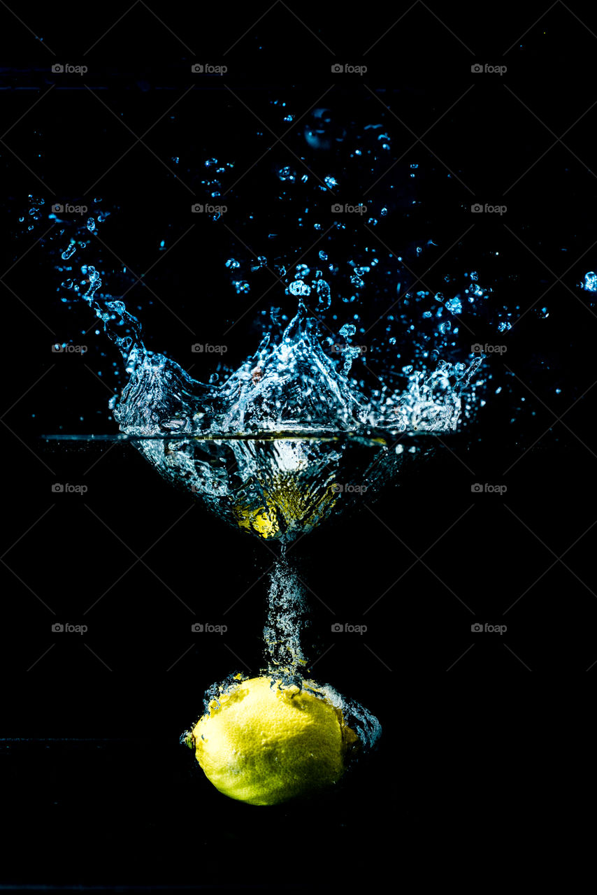 yellow citrus in black water