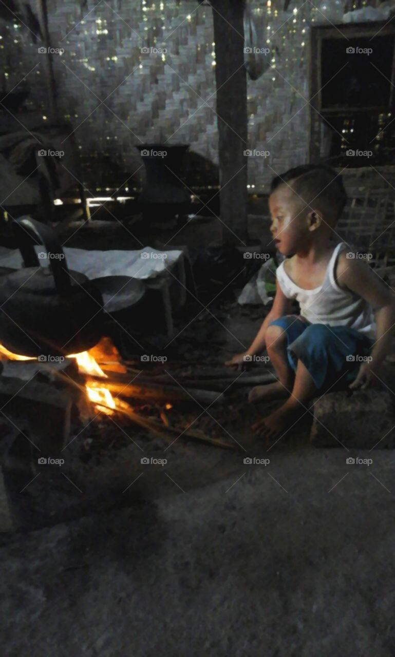 Kid playing fire