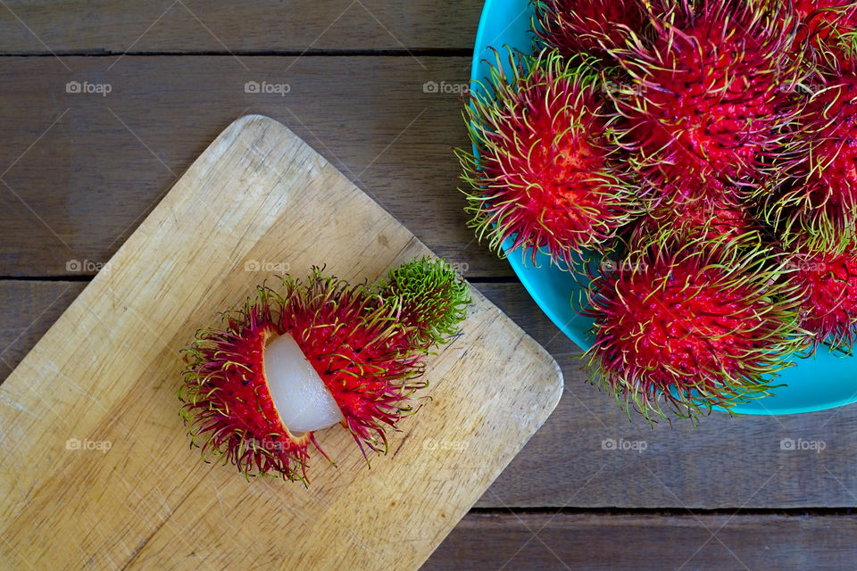 Ripe rambutan tropical fruits.