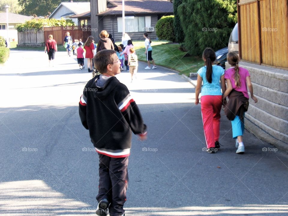 Youth walking home from school