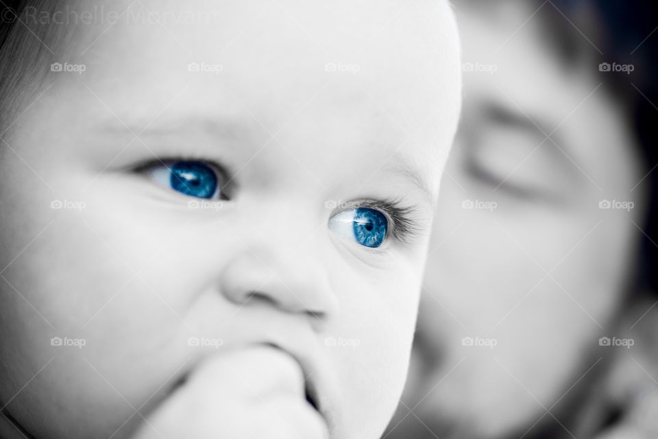 Close-up of a baby with blue eyes
