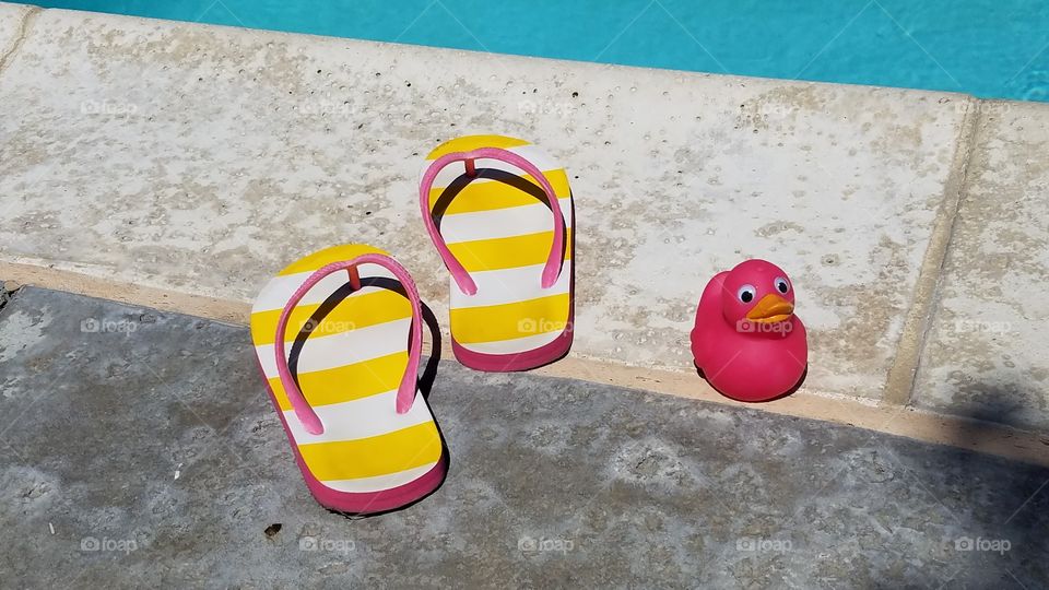 Pink duck and flip flops