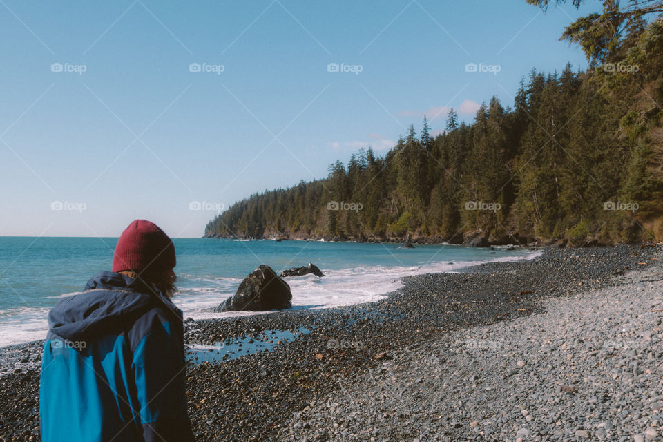 boy explores a rocky Vancouver beach