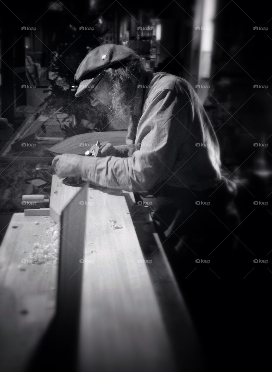 Wood worker in shipyard